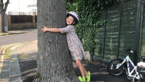 Mabel Longstaff hugging tree